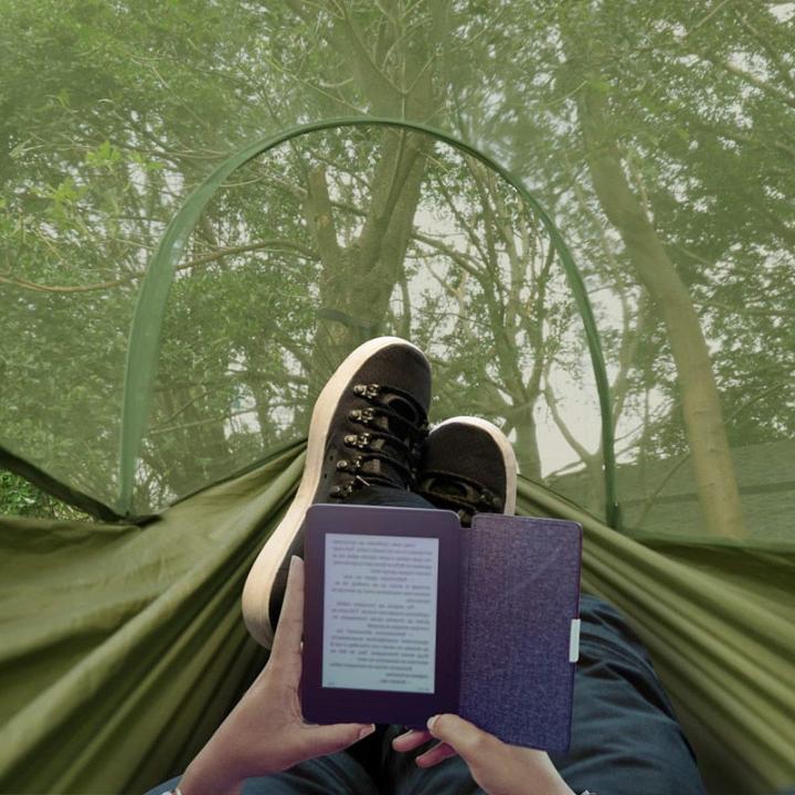 Outdoor hammock with mosquito net and sunshade