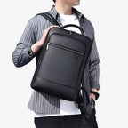 Leather backpack with USB charging port for 15.6-inch laptop