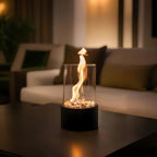 Table fireplace with glass cylinder and metal base