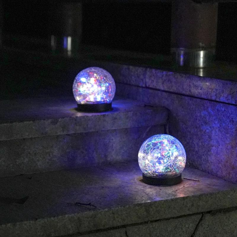 Solar LED garden light with flower pattern