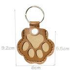 Leather paw keychain with storage compartment