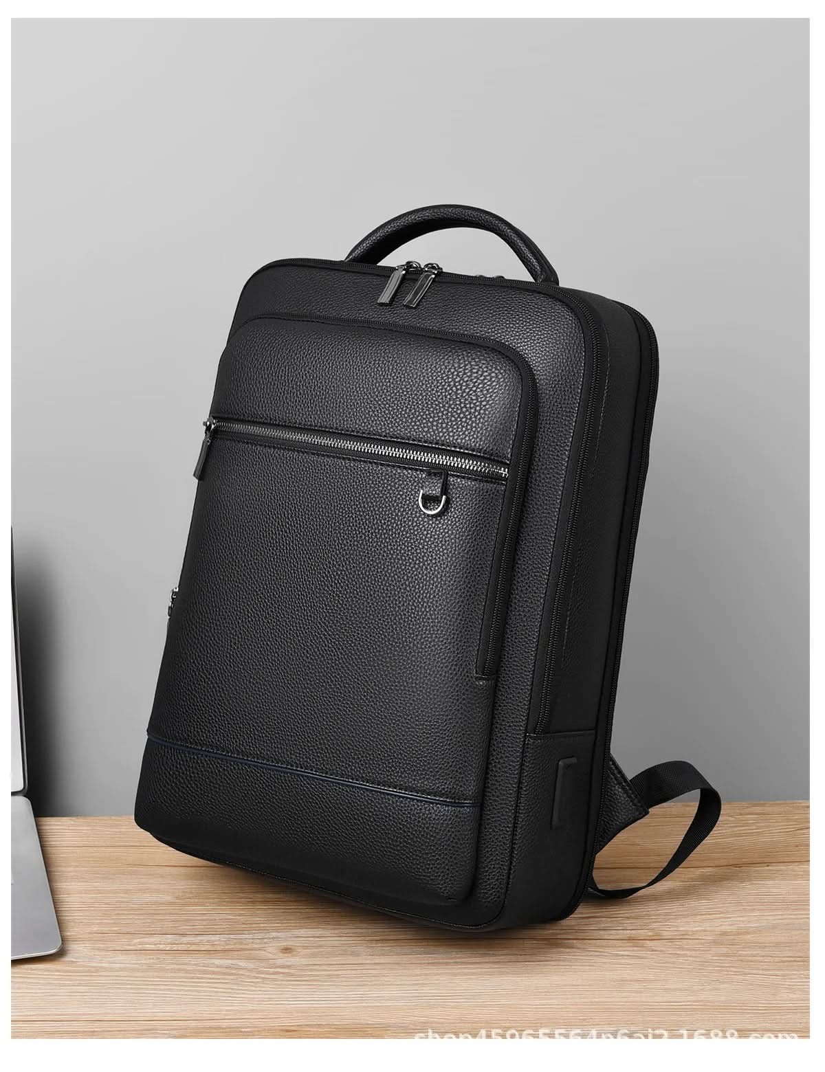 Leather backpack with USB charging port for 15.6-inch laptop