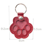 Leather paw keychain with storage compartment