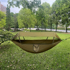 Outdoor hammock with mosquito net and sunshade
