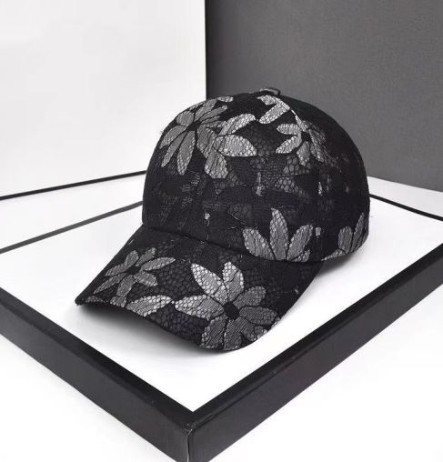 Baseball cap with sequin butterfly and mesh material