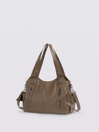 Handtasche mit Reißverschlusstaschen und abnehmbarem Trageriemen