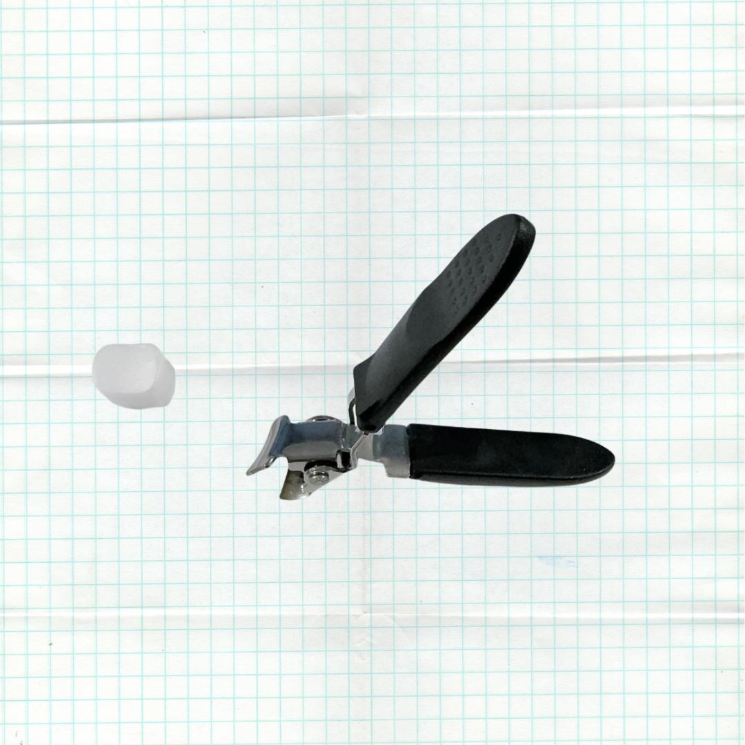 Nail clipper with angled blade for ingrown nails