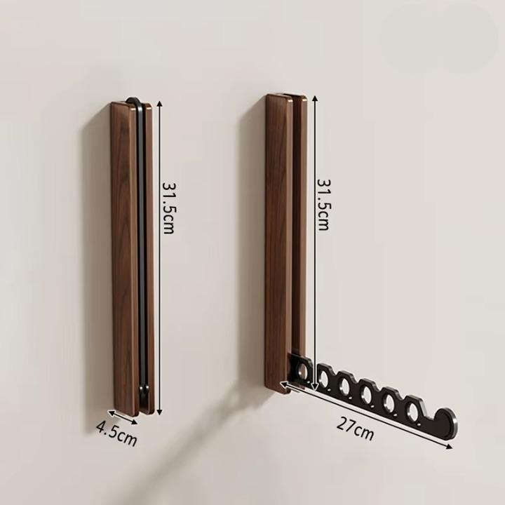 Foldable wall-mounted wooden coat rack with a space-saving design