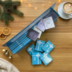 Book advent calendar with 25 mini books on a bookshelf, turquoise