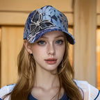 Baseball cap with sequin butterfly and mesh material