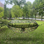 Outdoor hammock with mosquito net and sunshade