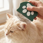 Pet comb with paw print handle