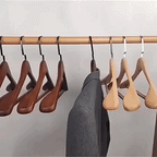 Wooden hanger with curved shoulder shape