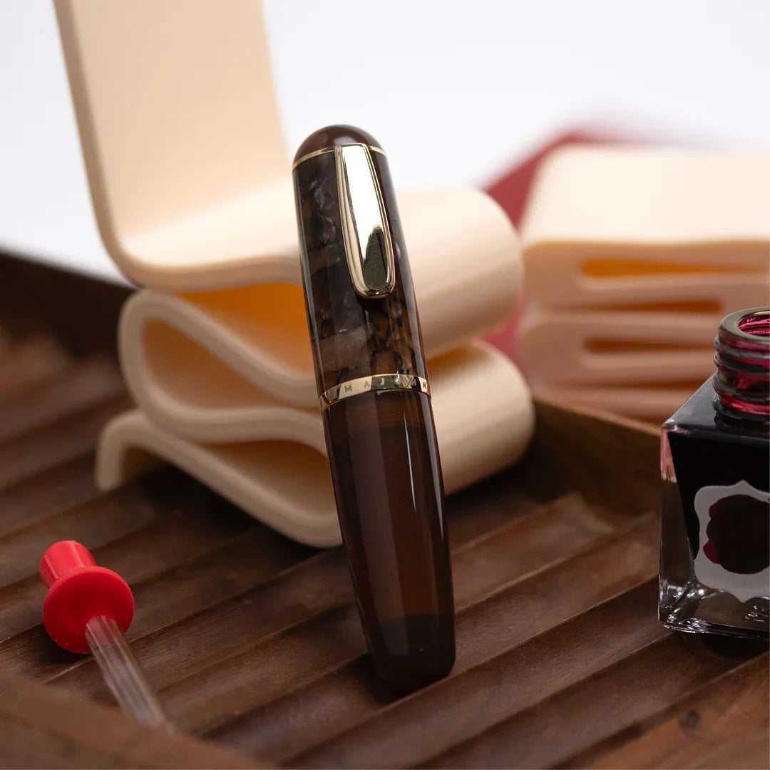 Fountain pen with fine nib and acrylic body