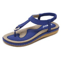 Toe separator sandals with elastic strap
