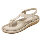 Toe separator sandals with elastic strap