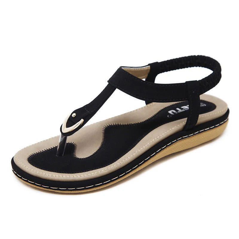 Toe separator sandals with elastic strap