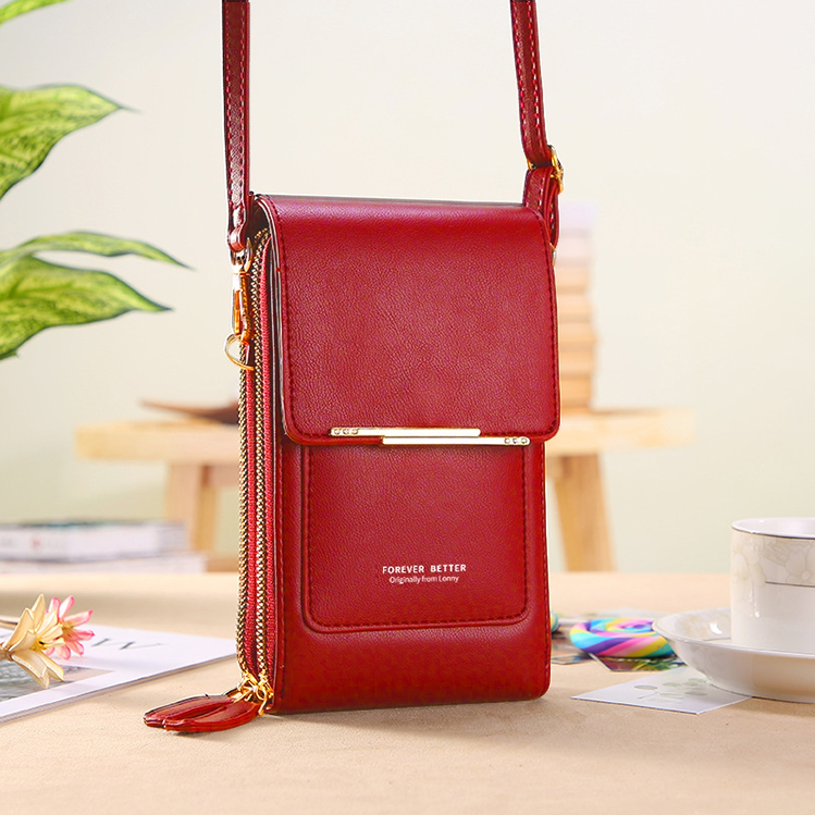 Crossbody bag with touchscreen window