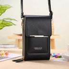 Crossbody bag with touchscreen window
