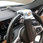 Steering wheel lock with triple locking mechanism