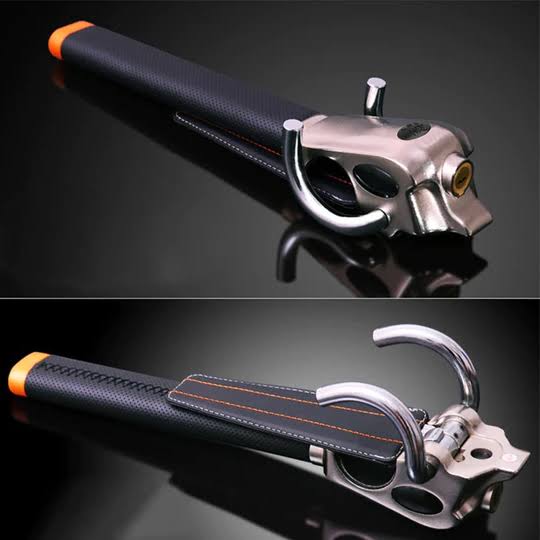 Steering wheel lock with triple locking mechanism