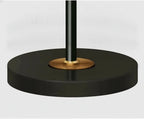 Stehlampe mit verstellbarem Lampenkopf und Bogenstab