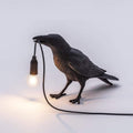 Raben-Tischlampe – Künstlerisches Design mit warmem Licht