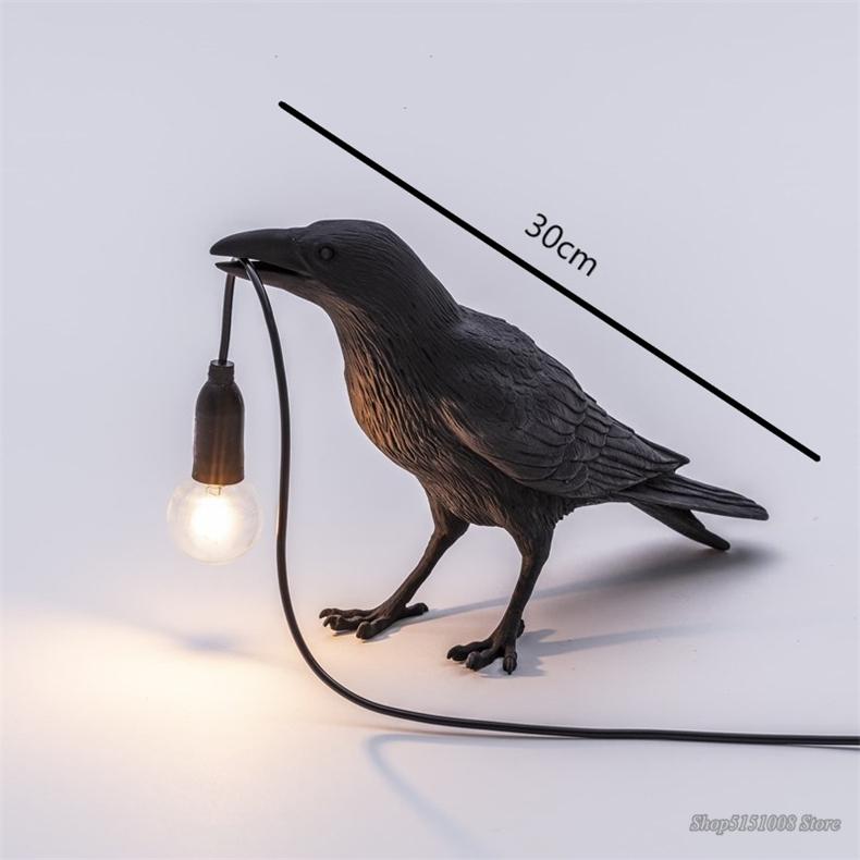 Raben-Tischlampe Harz mit Glühbirne
