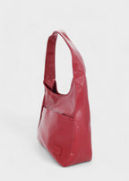 Shoulder bag made of faux leather with external pocket