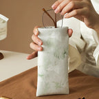 Self-closing glasses case with soft microfiber lining