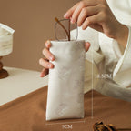 Self-closing glasses case with soft microfiber lining