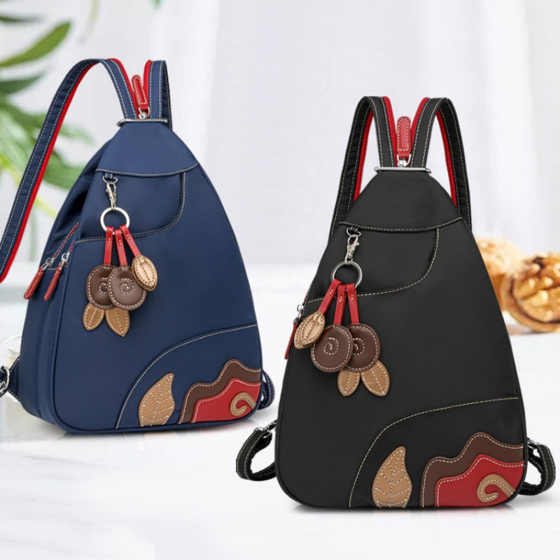 Damenrucksack aus Nylon – Vielseitig tragbar mit Blumenanhänger