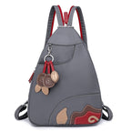 Damenrucksack aus Nylon – Vielseitig tragbar mit Blumenanhänger