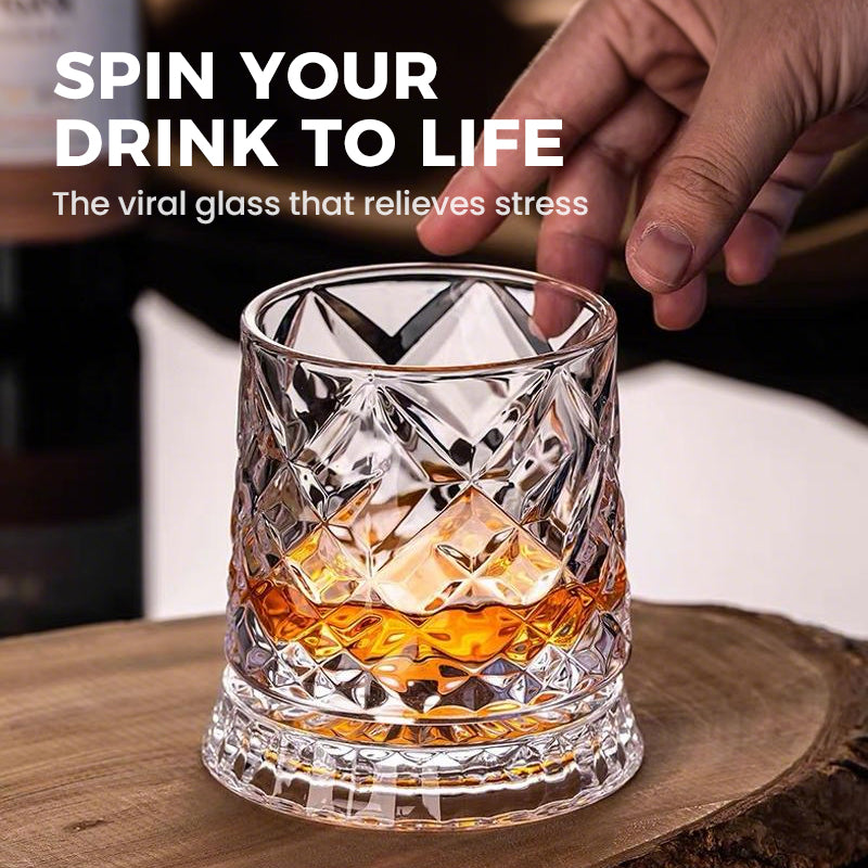 Rotating whisky glass with embossed crystal pattern