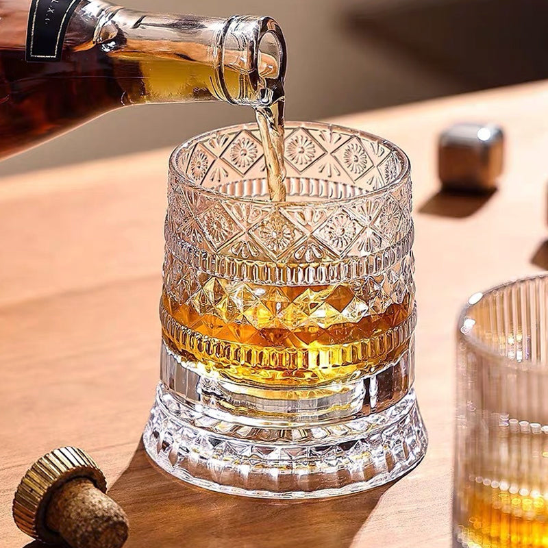 Rotating whisky glass with embossed crystal pattern