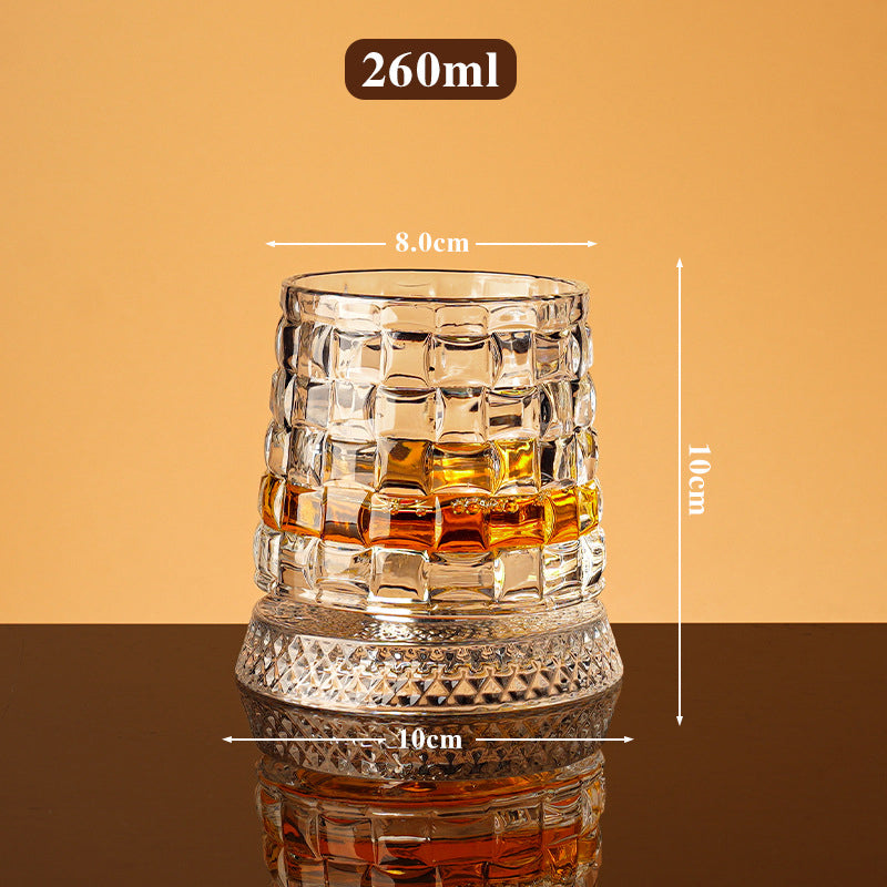 Rotating whisky glass with embossed crystal pattern