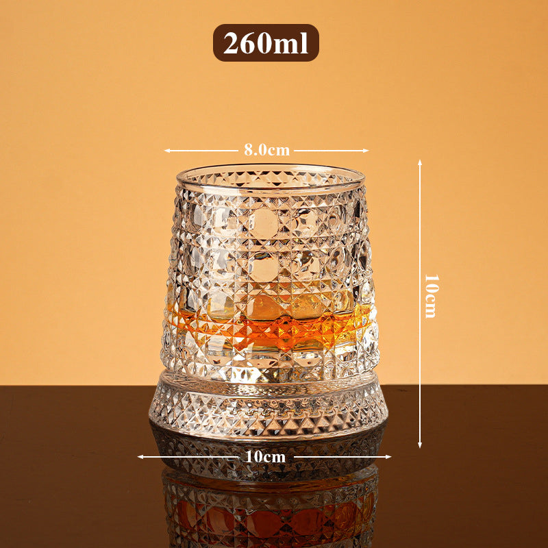 Rotating whisky glass with embossed crystal pattern