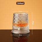 Rotating whisky glass with embossed crystal pattern