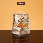 Rotating whisky glass with embossed crystal pattern
