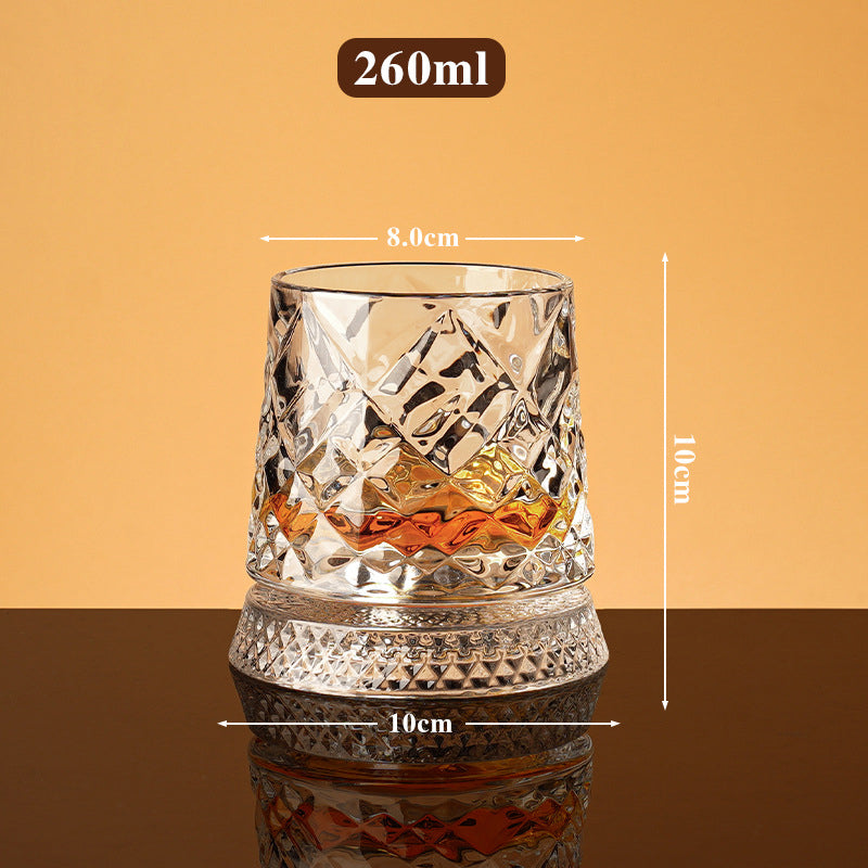 Rotating whisky glass with embossed crystal pattern