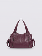 Handtasche mit Reißverschlusstaschen und abnehmbarem Trageriemen