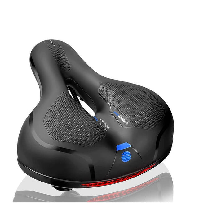 Ergonomic bicycle saddle with padding and reflector strips