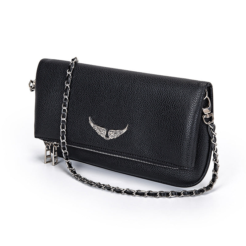 Clutch with rhinestone details and chain shoulder strap
