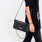 Clutch with rhinestone details and chain shoulder strap