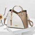 Handtasche Kunstleder mit Metallhenkeln und Herz-Anhänger