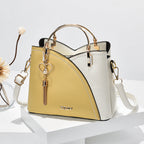Handtasche Kunstleder mit Metallhenkeln und Herz-Anhänger